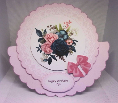 8 in scalloped edged pink floral rocker card.