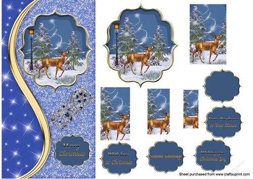 Stag in a winter forest on blue glittery DL card.