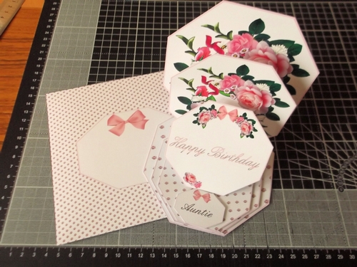 Pink floral octagonal triple easel card with matching envelope.