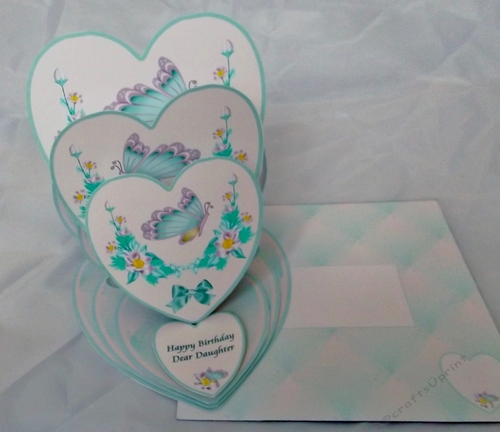 Pastel floral heart shaped triple easel card with matching envelope.