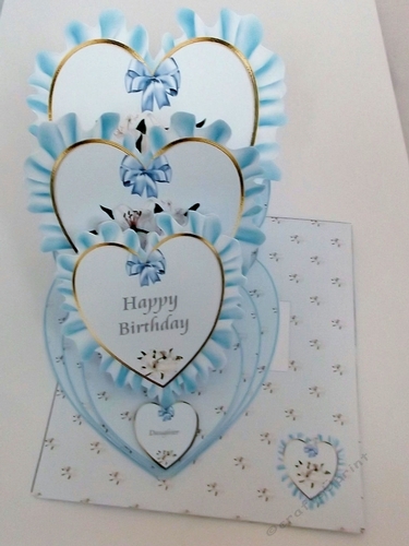 Blue Birthday triple heart easel card and matching envelope.
