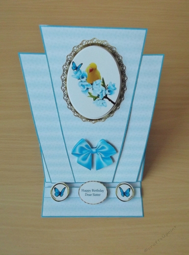 Canary triangle easel card in blue.