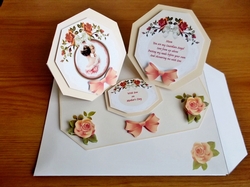 Peach coloured octagonal double easel card with matching envelope.