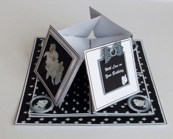 White orchid on black background quad easel card.