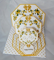Yellow floral octagonal triple easel card and matching envelope.