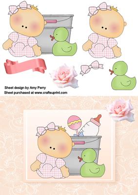 Adorable Baby Girl in a Bucket with Baby Toys