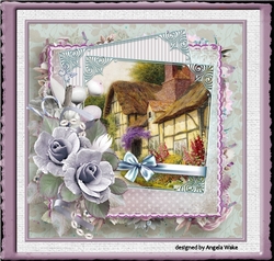 Thatched roof cottage and rose