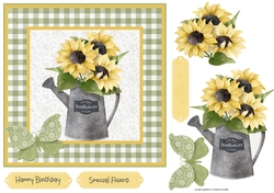 sunflowers in a watering can
