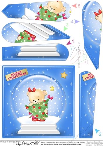 Christmas Teddy Rosie has a Christmas Tree Snowglobe Fan Pyramage Topper