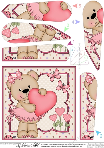 Livvy Bear has a Heart Fan Pyramage Topper