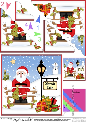 Christmas Santa is at the North Pole Fan Pyramage Topper