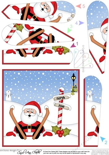 Christmas Santa is at the North Pole Fan Pyramage Topper