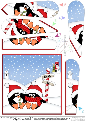 Christmas Penguins are at the North Pole Fan Pyramage Topper
