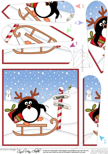 Christmas Penguin is at the North Pole Fan Pyramage Topper