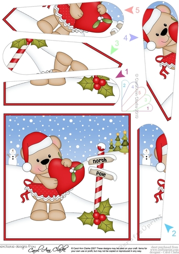 Christmas Livvy Bear has a heart and mistletoe Fan Pyramage Topper