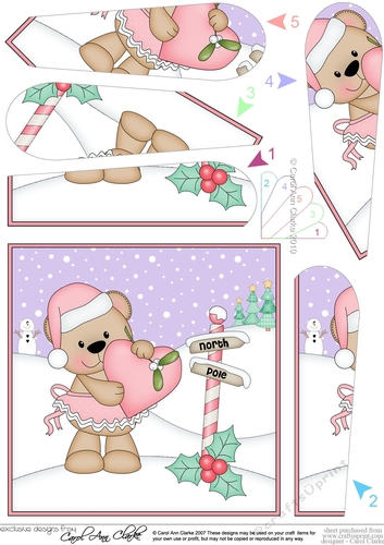 Christmas Livvy Bear has a heart and mistletoe Fan Pyramage Topper