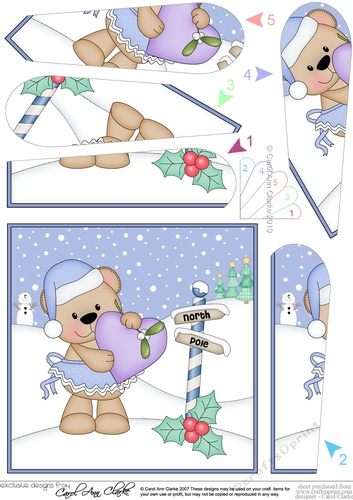 Christmas Livvy Bear has a heart and mistletoe Fan Pyramage Topper