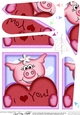 Zoe Piggy has a Love Heart Fan Pyramage Topper