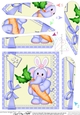 Lola Elephant has an Easter Carrot and Bunny Ears Fan Pyramage Topper