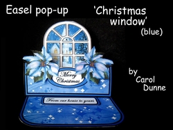 Easel pop-up Christmas window with blue poinsettias