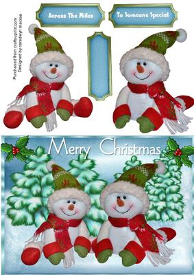 Cute Snowmen Sitting in the Snow 