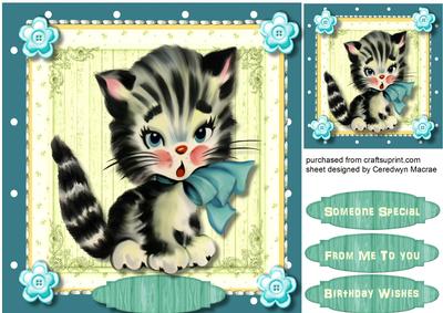 Lovely Little Kitten in His Blue Bow