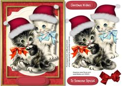 Two Adorable Kitties in There Santa Hats