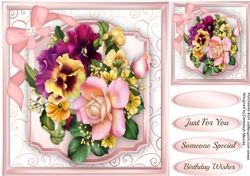 Beautiful Pansys and rose on a Ornate Mat