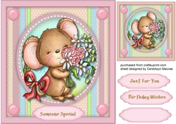 A Little Brown Mouse With Flowers