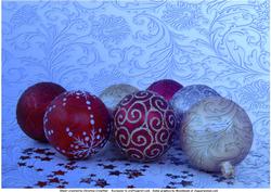 Christmas Baubles on Ice Blue Background