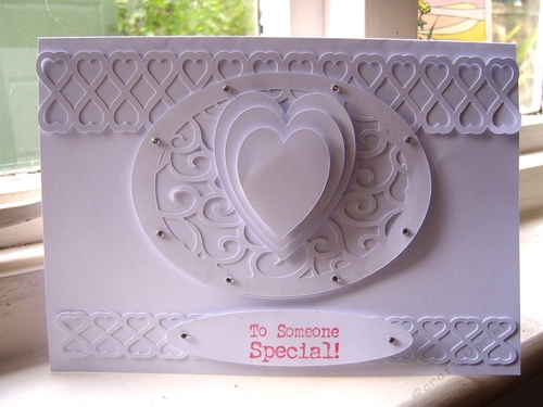 Scrolled mat with Hearts and heart ribbon borders