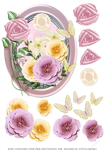 Pink and cream flowers in oval frame