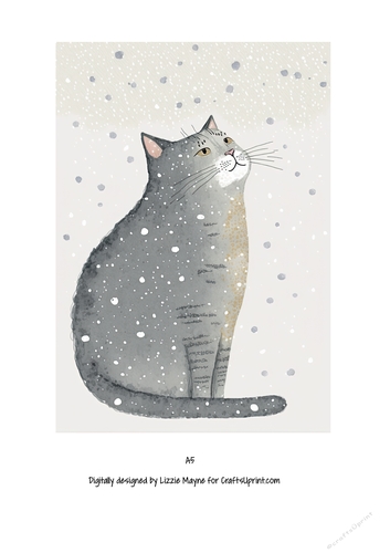Cat looking up at the snow
