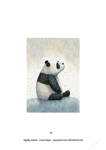 Panda bear looking up at the snow