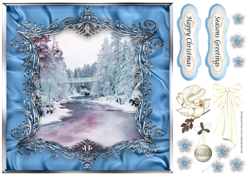 Winter scene in blue material frame with embellishments