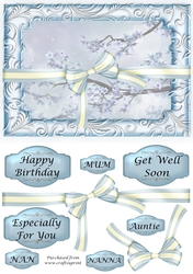 Pale blue blossom framed topper with bow
