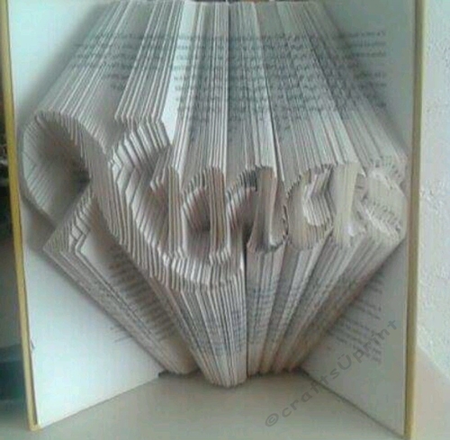 Xmas Black chancery font book folding pattern