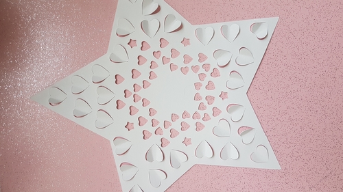 Beutiful star shape laser cut with pop up hearts SVG cutting files.