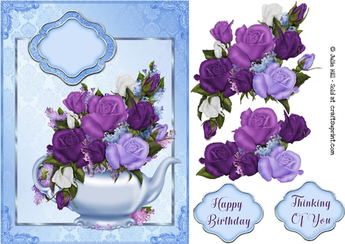 Blue teapot and purple roses