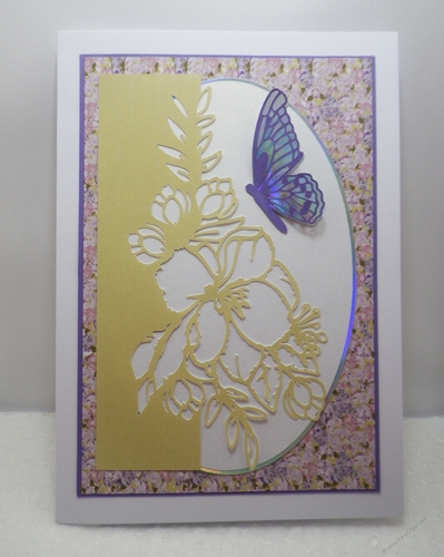 Cutaway floral and butterfly topper
