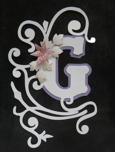Embellished letter G