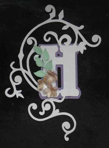Embellished letter H