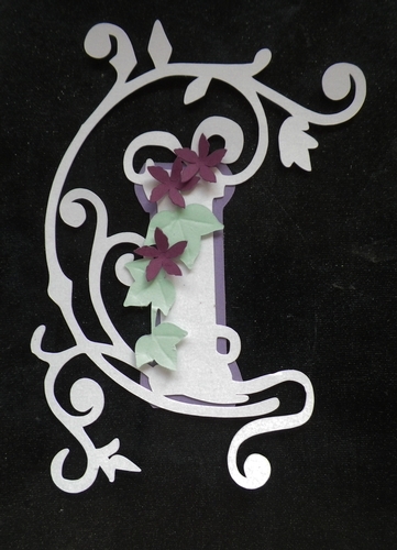 Embellished letter I
