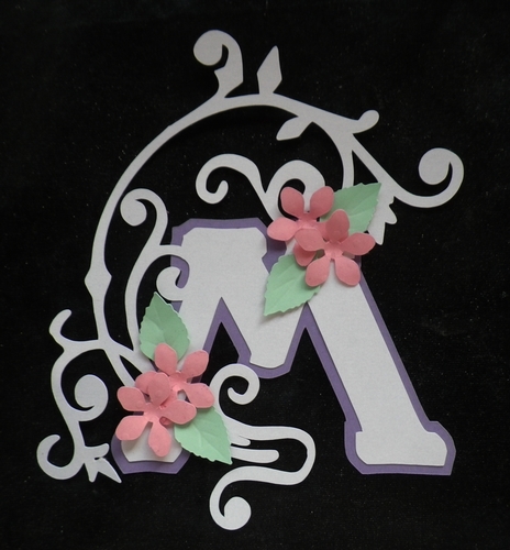 Embellished letter M