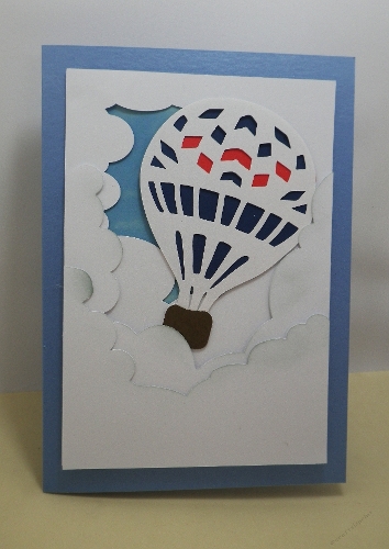 Clouds with hot air balloon topper