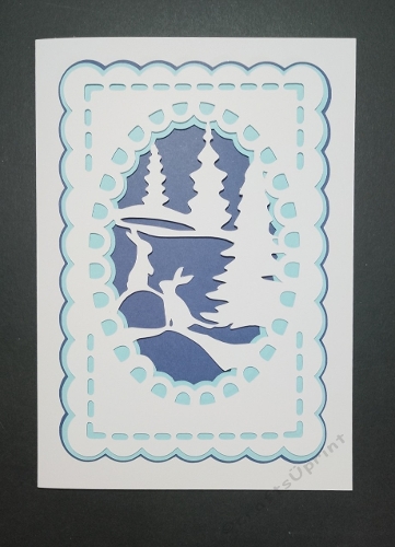 Snow scene with rabbits in oval topper