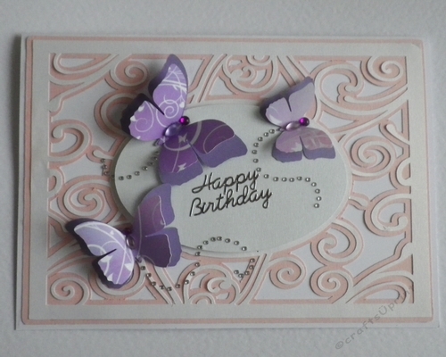Swirly background with butterflies topper