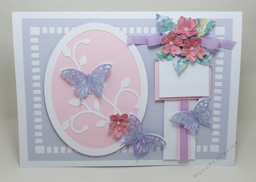 Framed butterfly and floral topper