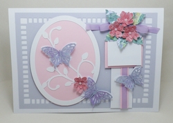 Framed butterfly and floral topper