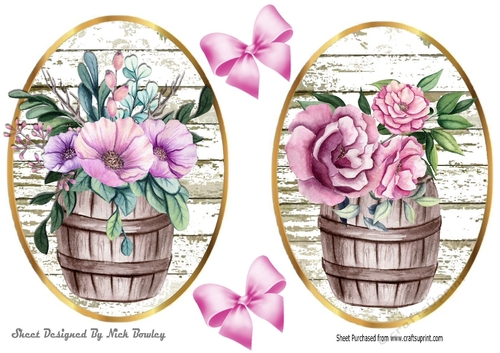 Two pretty flowers in barrel toppers with bows